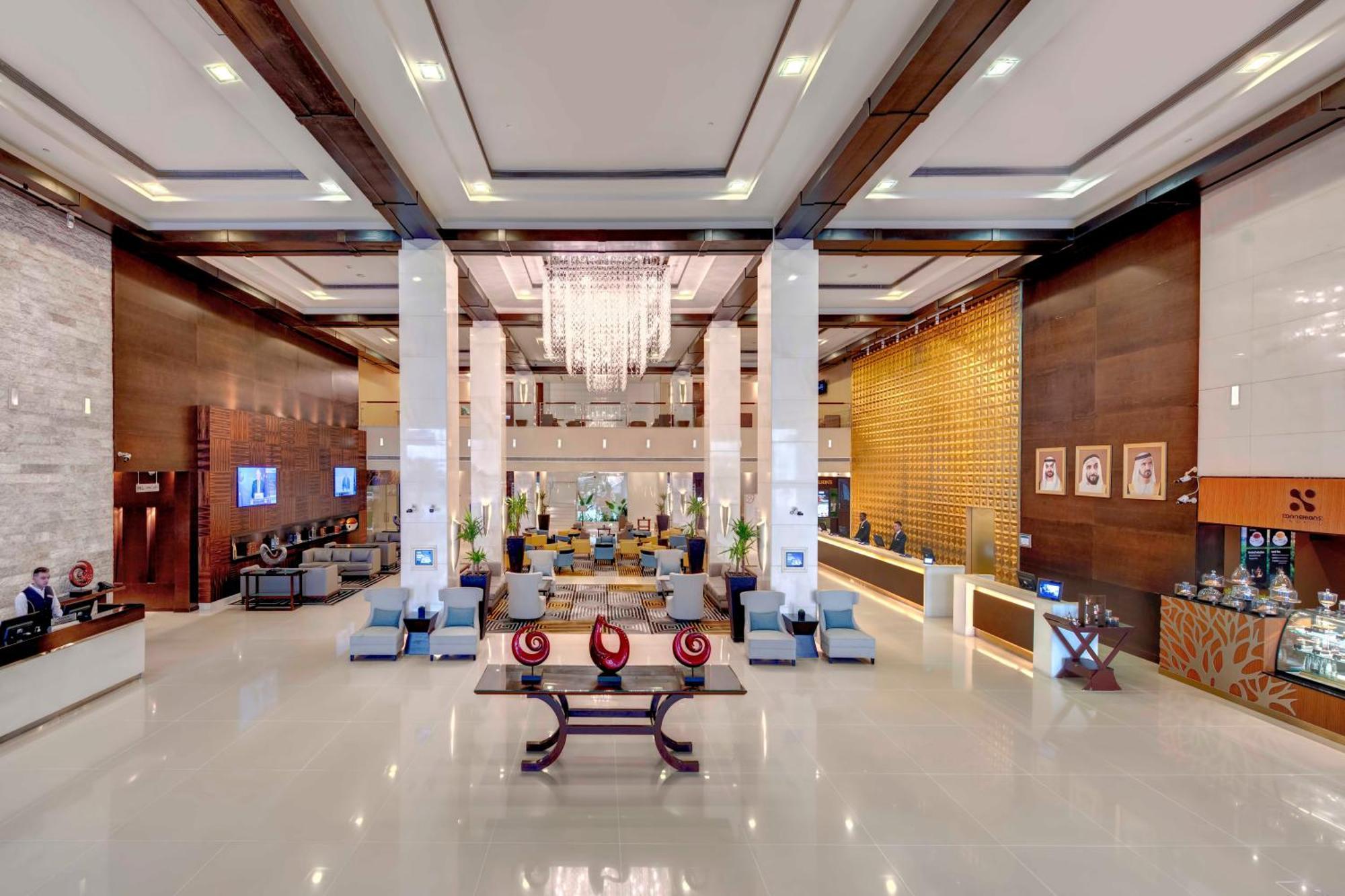 Hotel Media Rotana Dubái Exterior foto Lobby